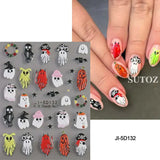 Halloween nails with 5D embossed stickers featuring ghost, pumpkin, and skull art designs.