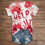 Vintage women's Halloween shirt with red letter print "HELP" and distressed denim shorts on a wooden background.