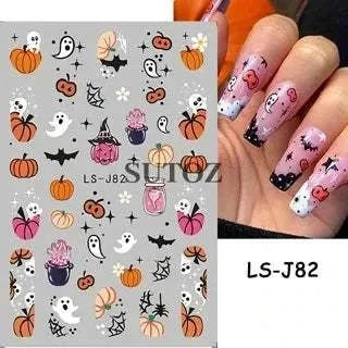 Halloween nails with 5D embossed stickers featuring ghost, pumpkin, and skull designs.