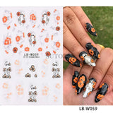 Halloween nails with 5D embossed stickers featuring ghost, pumpkin, and skull art designs.