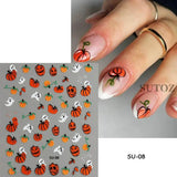 Halloween nails with 5D embossed stickers featuring ghost, pumpkin, and skull art.