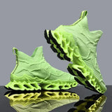 Breathable green mesh tennis shoes for men with unique sole design.