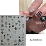 Halloween nails with 5D embossed stickers featuring ghost, pumpkin, and skull art.